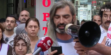 aç